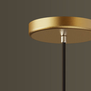 Antique brass bell pendant lamp detail — vintage metal ceiling light