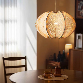 Handcrafted wood pendant showing irregular organic form