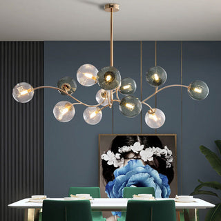 Modern gold glass pendant illuminated — farmhouse brass warm