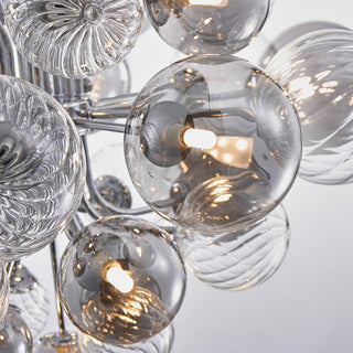 Modern designer bubble glass chandelier ambient — cluster warm glow