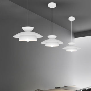 Round white LED pendant in interior — dimmable modern lamp