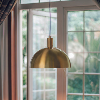 Pendant with brass dome shade — mid-century modern