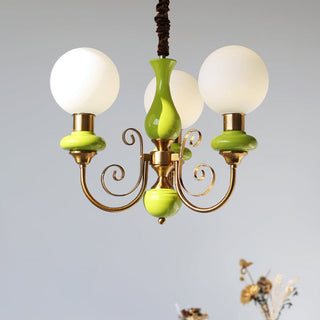 Green shade onyx chandelier metal frame close-up side view