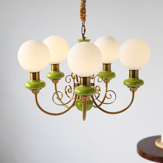 Green shade onyx metal chandelier hanging close-up view