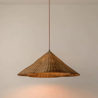 Woven rattan pendant with scalloped boho kitchen shade