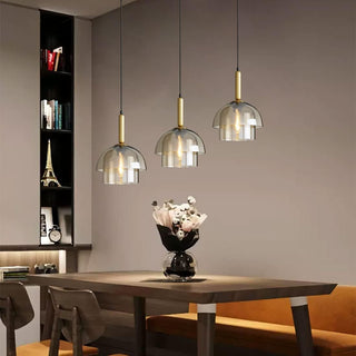 Multi-layer pendant detail — glass dome kitchen island fixture