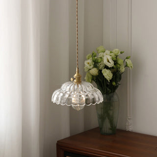 Adjustable cord pendant with clear glass fixture