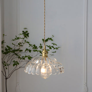 Mid-century clear glass pendant over kitchen counter