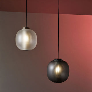 Frosted glass lantern pendant close-up — retro iron frame lamp
