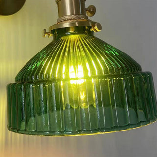 Retro brass glass pendant showing vintage hardware details