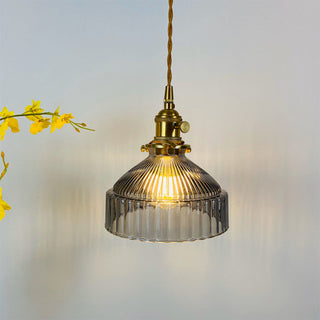 Retro brass and glass pendant for vintage-inspired dining