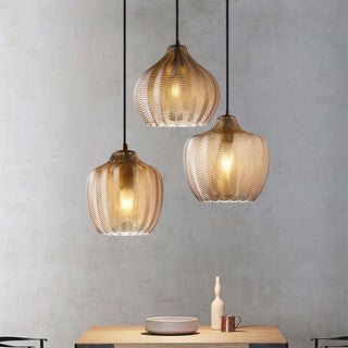 Scandinavian pendant with single glass shade and metal base