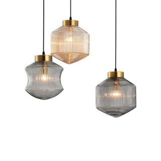 Modern pendant with transparent glass shade and brass hardware