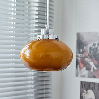 Yellow glass pendant close-up — Bauhaus adjustable ceiling lamp