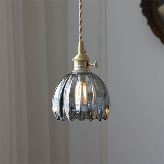 Pendant with botanical flower glass shade over kitchen island