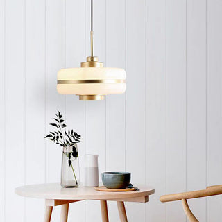 Metal glass pendant from below — Scandinavian soft glow light