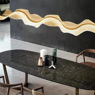 Contemporary pendant with water ripple glass diffuser