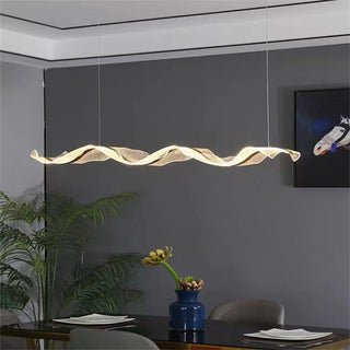 Modern pendant with sculptural water ripple glass shade