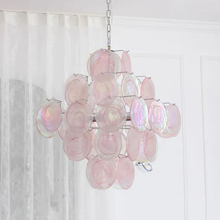 Pink Murano glass chandelier side — vintage iron frame warm glow