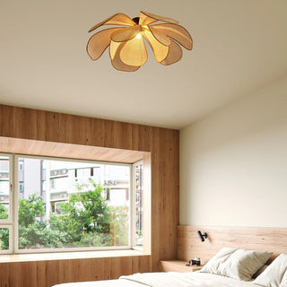 Handwoven rattan pendant with petal-shaped shade