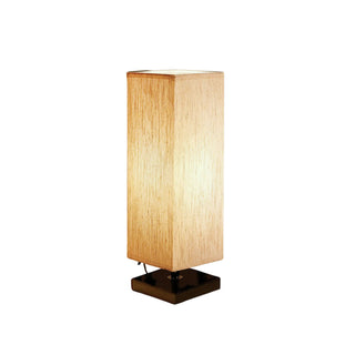 Ivory tower lamp side view — modern soft warm glow