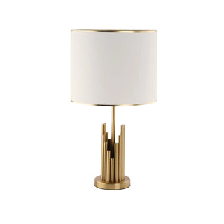 Architectural golden spire lamp front — modern elegant design