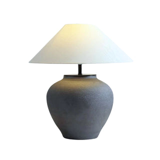 Matte black ceramic pottery table lamp — rounded silhouette