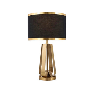 Black and gold brass lamp front — elegant home office lighting