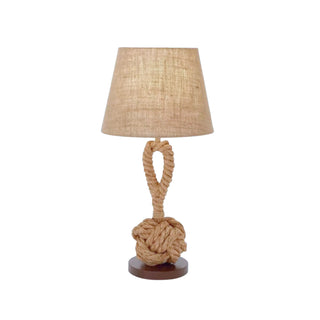 Natural beige artisan lamp — stylish warm glow side view