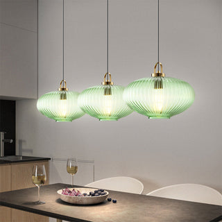 Green glass pendant with vintage lantern design