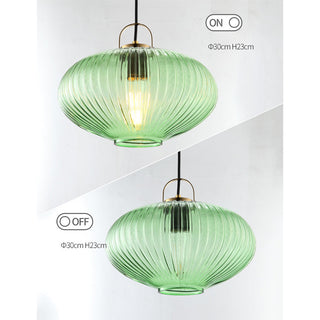 Vintage pendant with green lantern glass glow