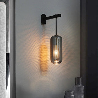 Nora black wall light illuminated — contemporary glass shade sconce