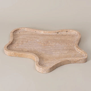 travertine stone tray earthworks luxury organic shape handcrafted decorative tray close-up