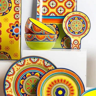 hand-painted ceramic dinnerware earthworks artisan crafted porcelain plates bowls set set view
