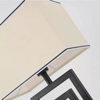 Spiral black metal base lamp — geometric side angle