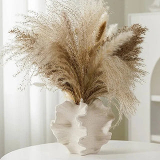 designer coral vase handcrafted porcelain ceramic beige modern minimalist decor side view