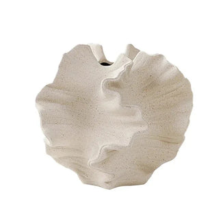 designer coral vase handcrafted porcelain ceramic beige modern minimalist decor close-up