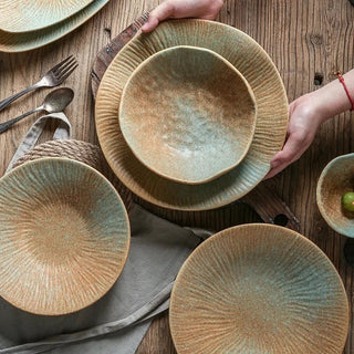 japanese ceramic dinnerware earthworks handcrafted porcelain bowls elegant plates set side view