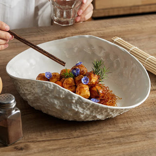 rock shell ceramic plate earthworks handcrafted luxury dining plate dishwasher safe close-up