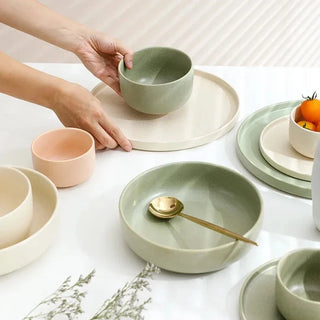 japanese ceramic dinnerware earthworks minimalist porcelain tableware pink plates bowls close-up