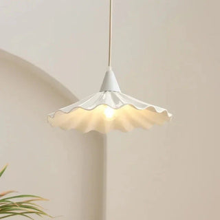 Ceramic ocean wave pendant close-up — handcrafted luxury lighting fixture