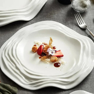white ceramic plate earthworks handcrafted porcelain plates unique wave design detail