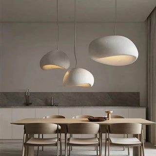 Greece Cove pendant illuminated — warm glow through handcrafted resin shade