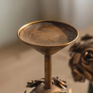 floral metal candlestick black iron candle holder copper accents detail