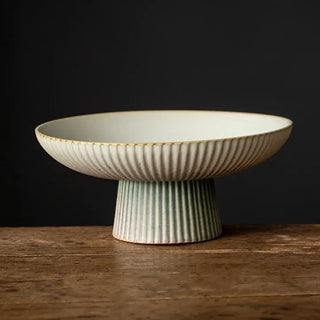 ceramic display bowl earthworks handcrafted japanese artisan vintage style light earth tableware close-up