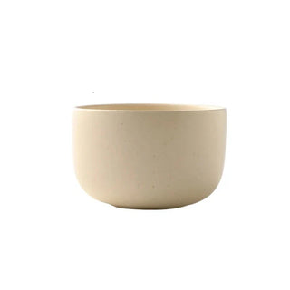 japanese ceramic dinnerware earthworks minimalist beige porcelain plates bowls handcrafted angle view