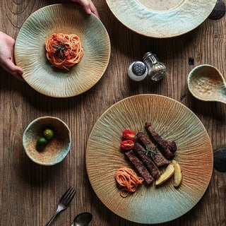 japanese ceramic dinnerware earthworks handcrafted porcelain bowls elegant plates set angle view