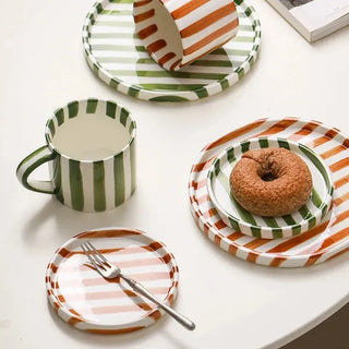 ceramic mug toscana collection hand painted orange striped cup lifestyle view