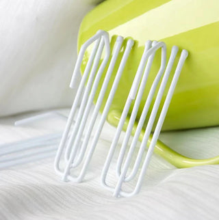 white curtain hooks 4 prong iron set secure hanging detail