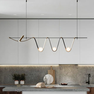 Handcrafted Síre pendant light glowing — warm ambient designer fixture
